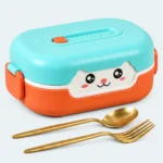Lunch box bébé portable orange et bleue, visage souriant sur le couvercle, avec cuillère et fourchette