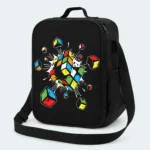 Sac isotherme enfant noir motif Cube éclaté, petits cubes colorés projetés autour du cube central
