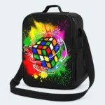 Sac isotherme enfant noir motif Néon, cube coloré sur éclaboussures de peinture multicolores