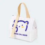 Petit sac isotherme repas blanc à motif ourson avec deux poignées beiges
