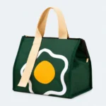 Petit sac isotherme repas vert à motif œuf avec deux poignées beiges