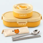 Ensemble lunch box enfant 1250 ml jaune et beige : boîte ovale, bol rond, pochette à couverts, cuillère et baguettes