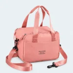 Petit sac isotherme repas rose avec anses et bandoulière